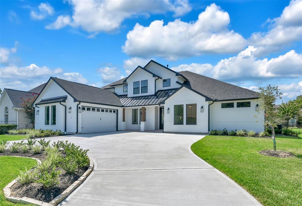 Similar Front Elevation of a Home Built by TX Best Home Builders with a Circle Driveway