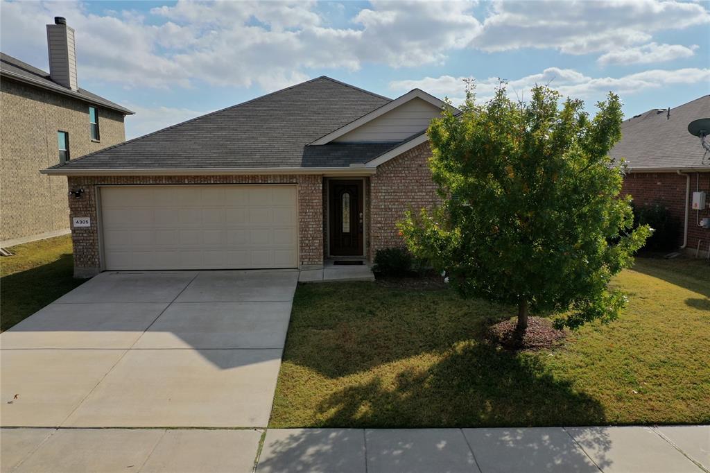 a front view of house with yard