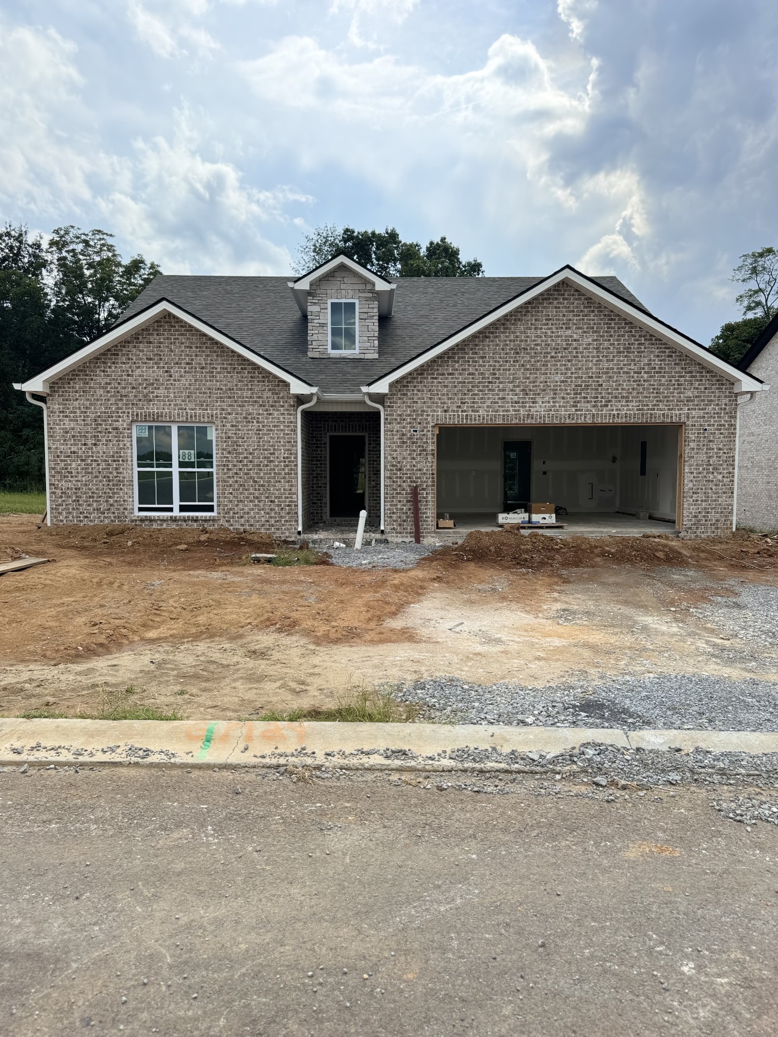 a view of house with yard and entertaining space