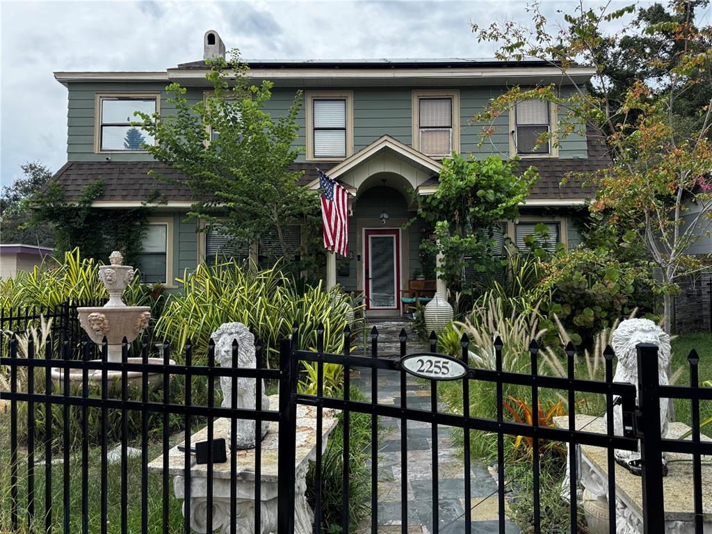 a front view of house and yard with seating space