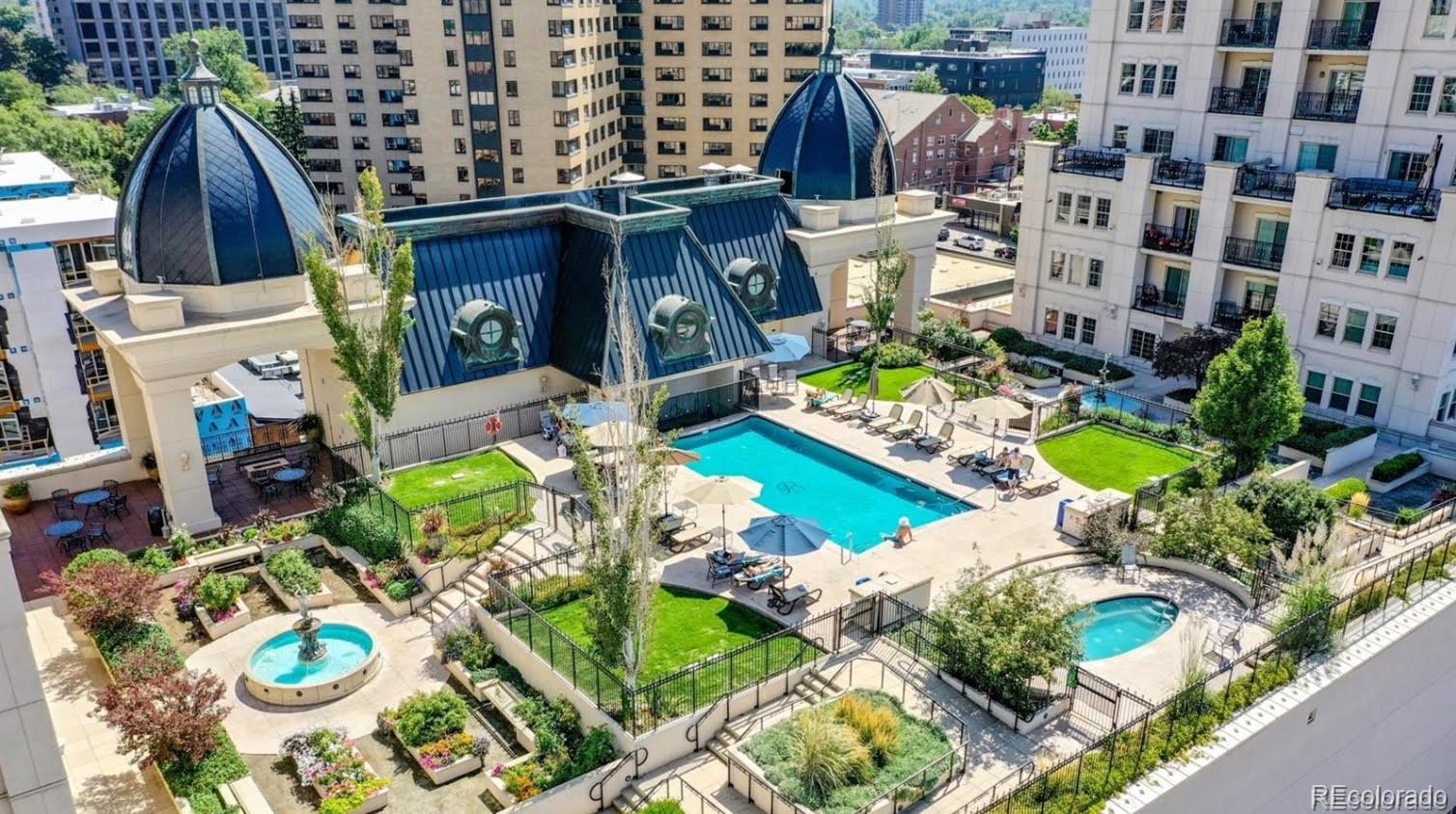 a view of swimming pool with outdoor seating