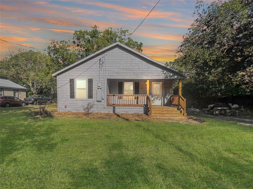 a house view with a garden space