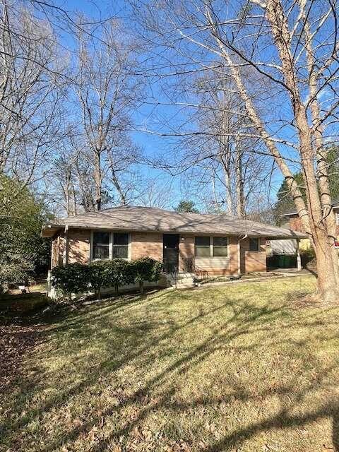 a house with trees in front of it