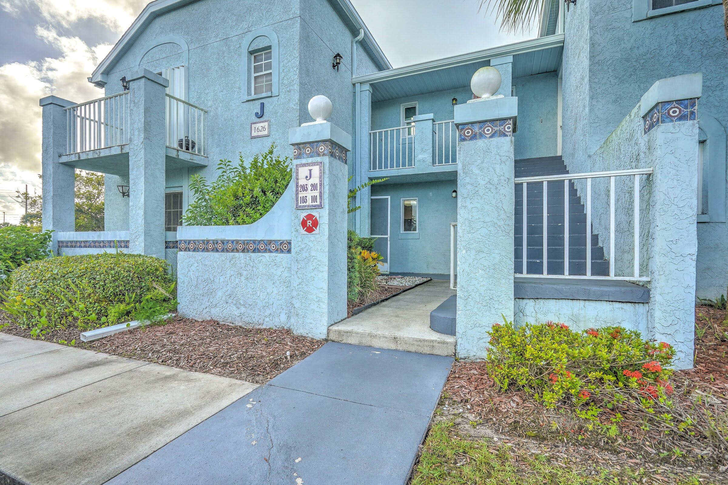 a front view of a house having yard