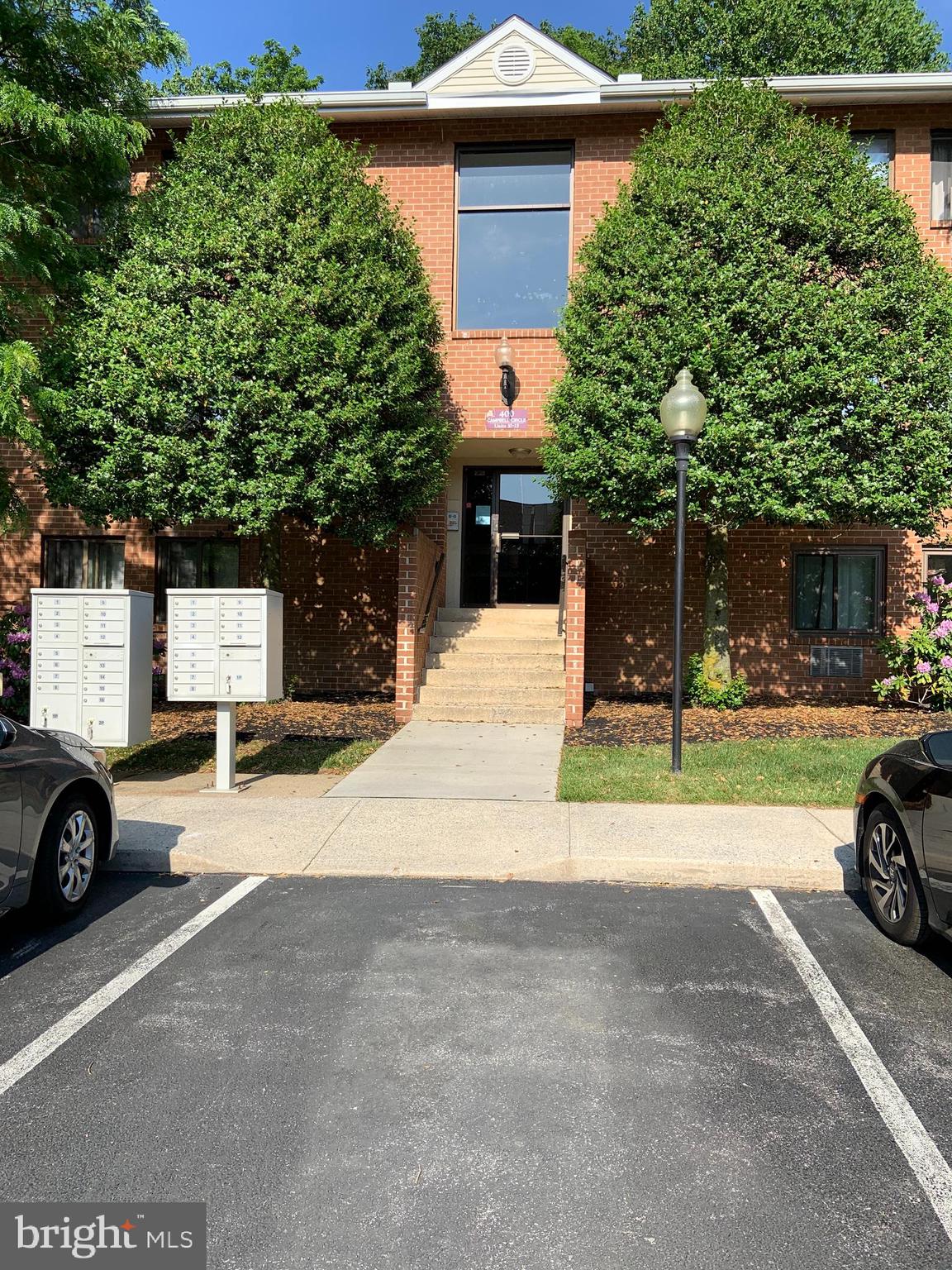 a building with trees in front of it