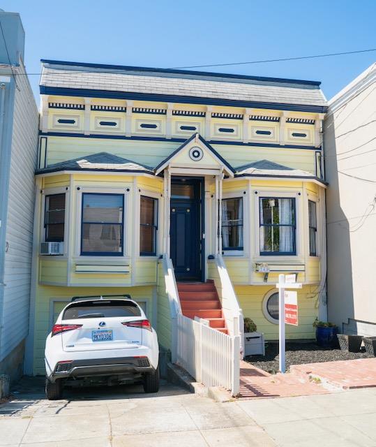 a car parked in front of a building