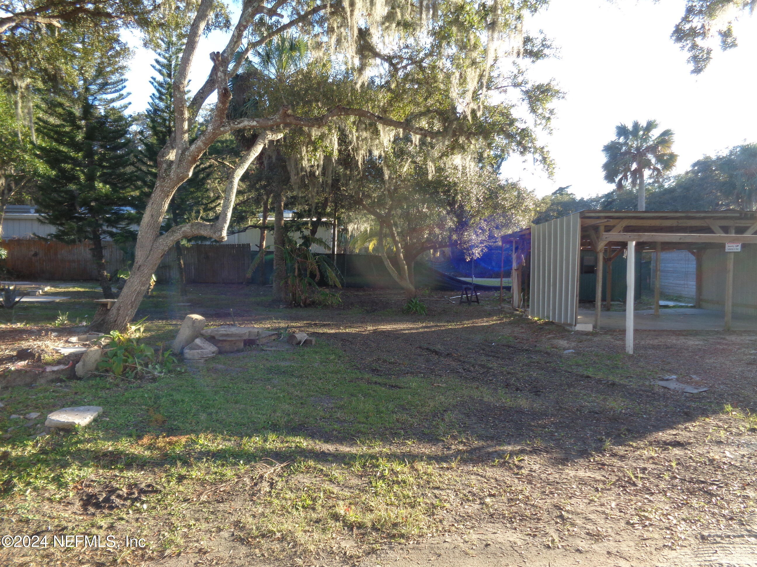 a view of backyard with green space