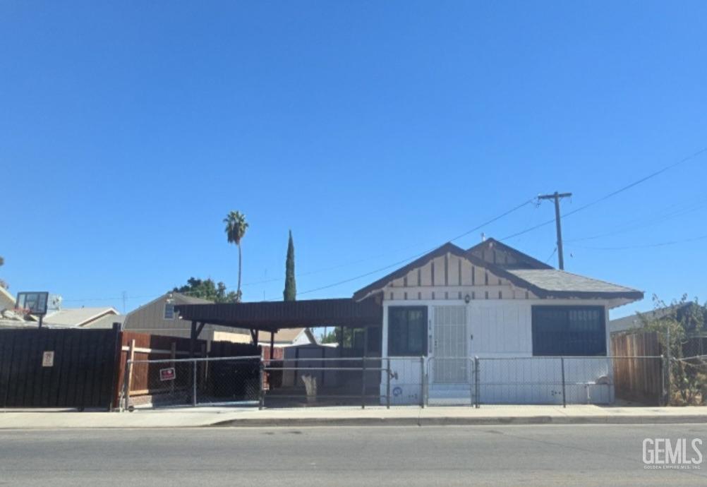 a view of a house next to a yard