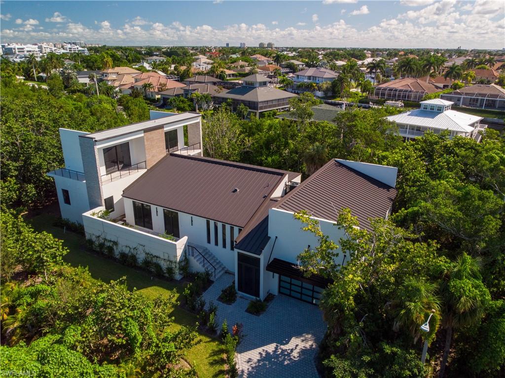 an aerial view of house with yard