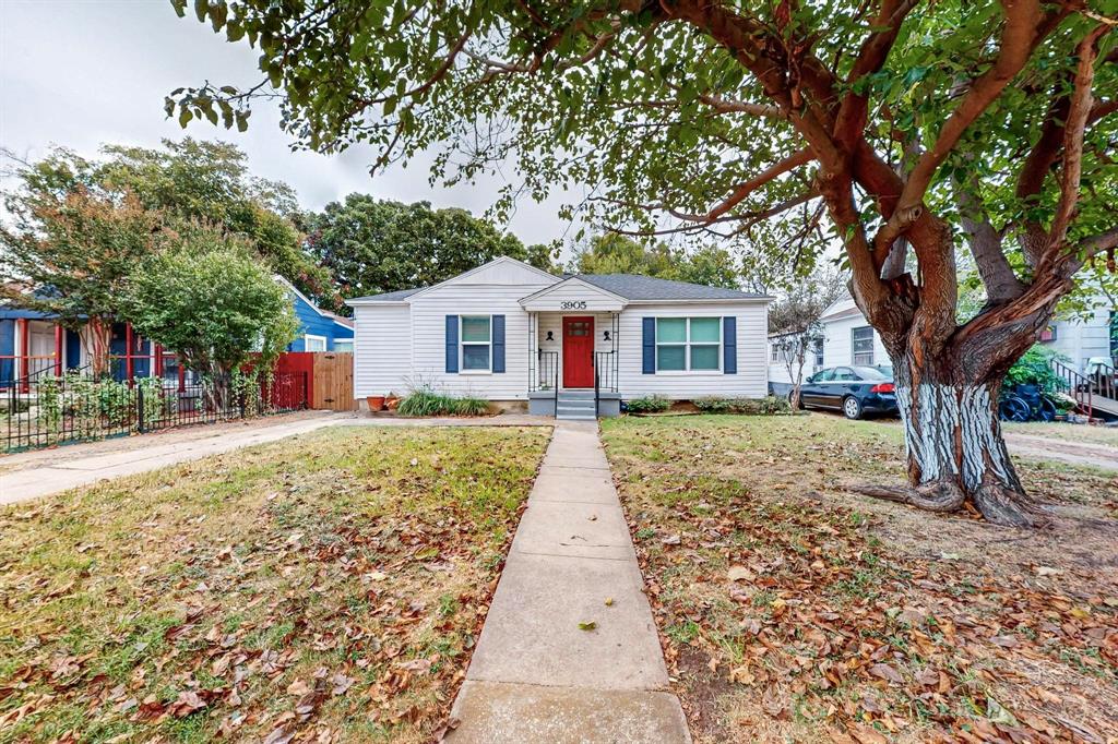 front view of a house with a yard