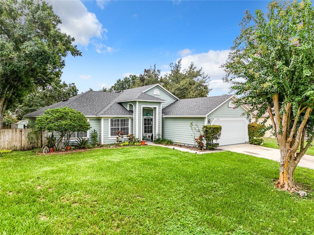 front view of a house with a yard