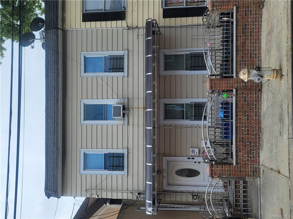 a front view of a house with garage