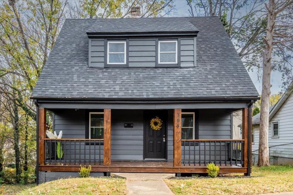 a brick house with a large window