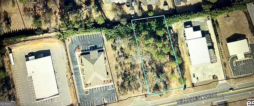 aerial view of a residential houses with yard