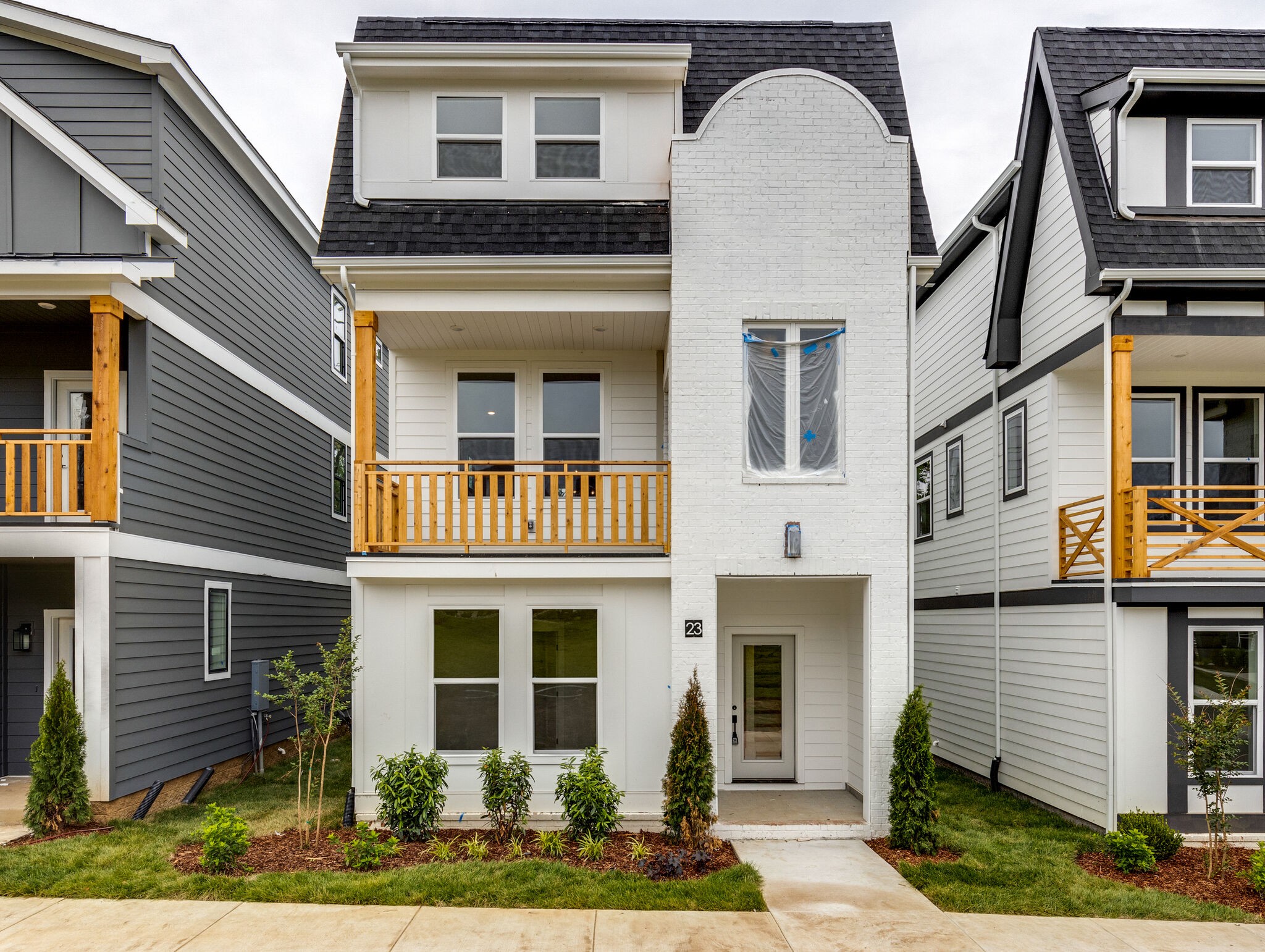 a front view of multiple houses