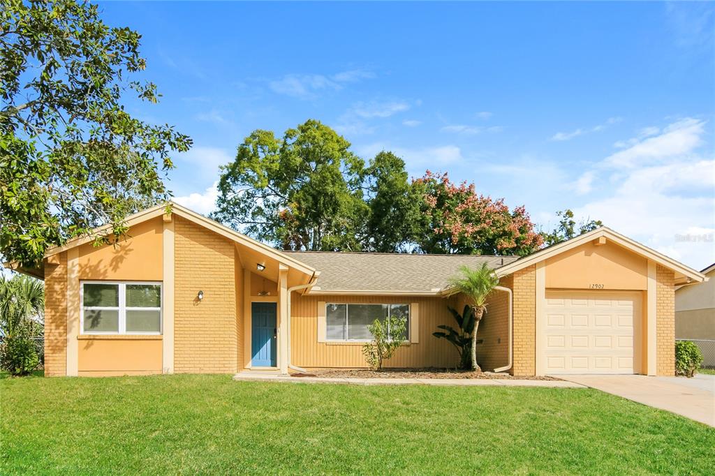 front view of a house with a yard