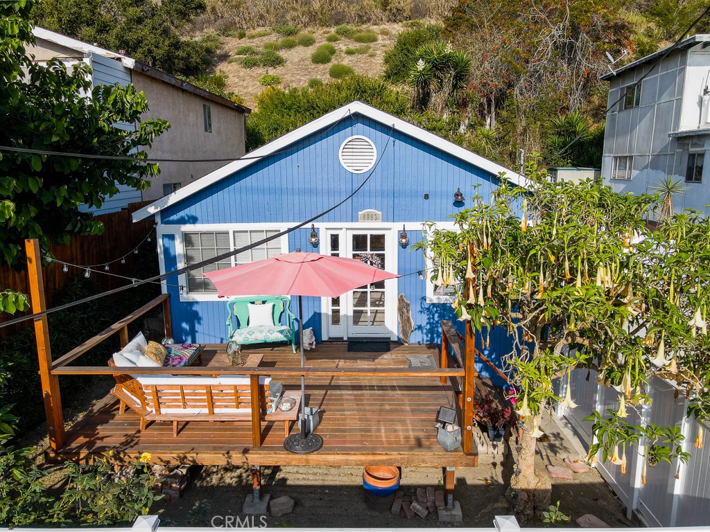 a front view of a house with yard