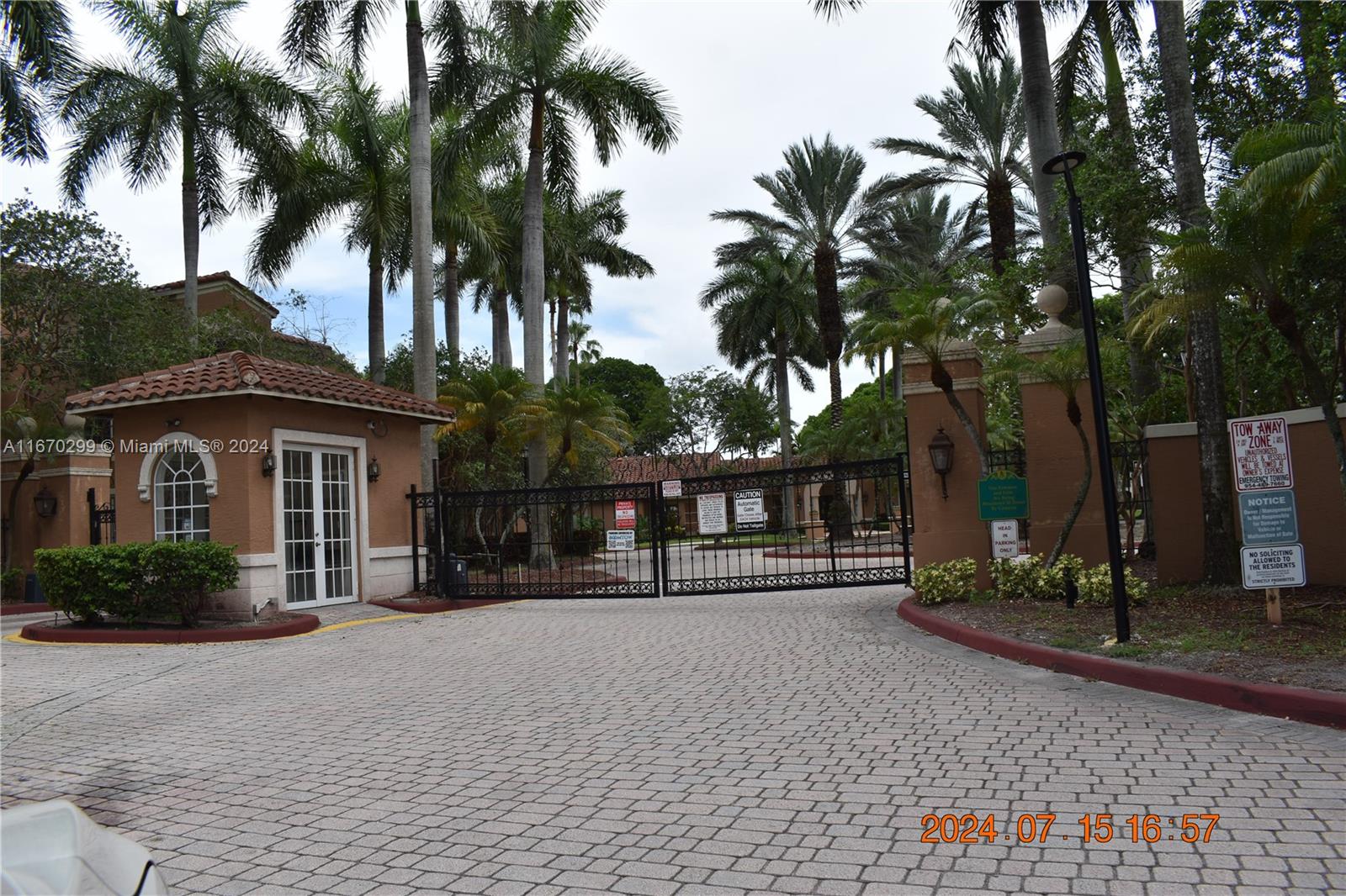 a house with palm tree in front of it