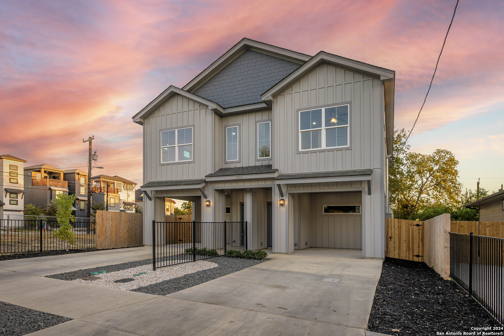 a front view of a house with a garage