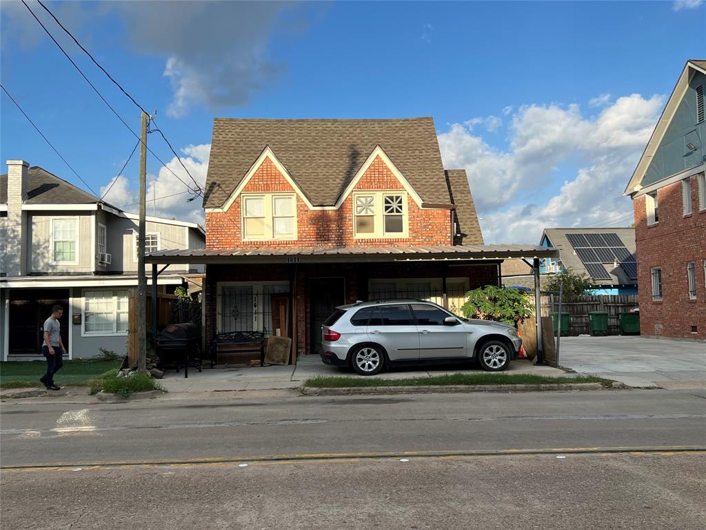 a car parked in front of a house