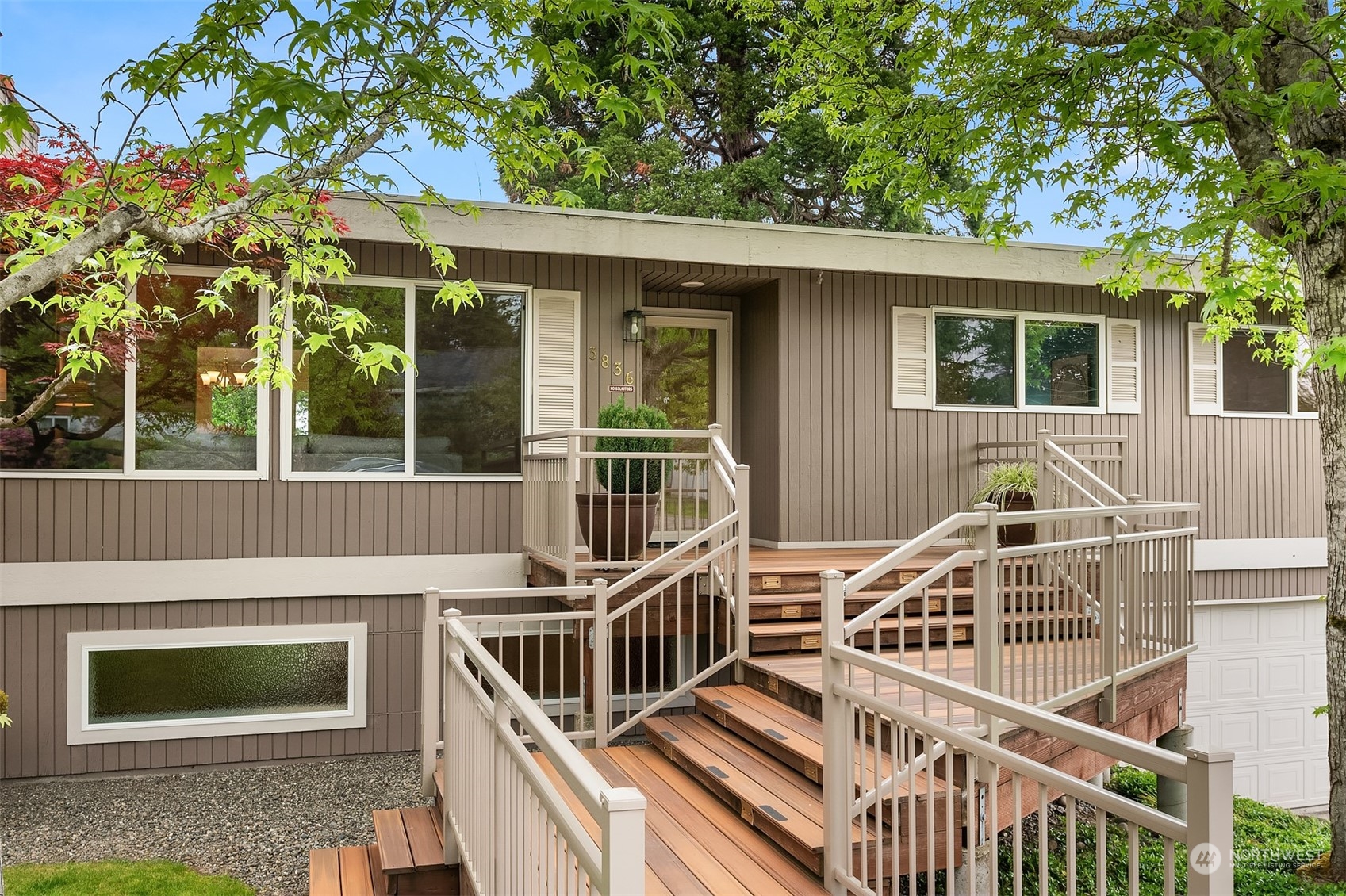 a view of a house with a deck