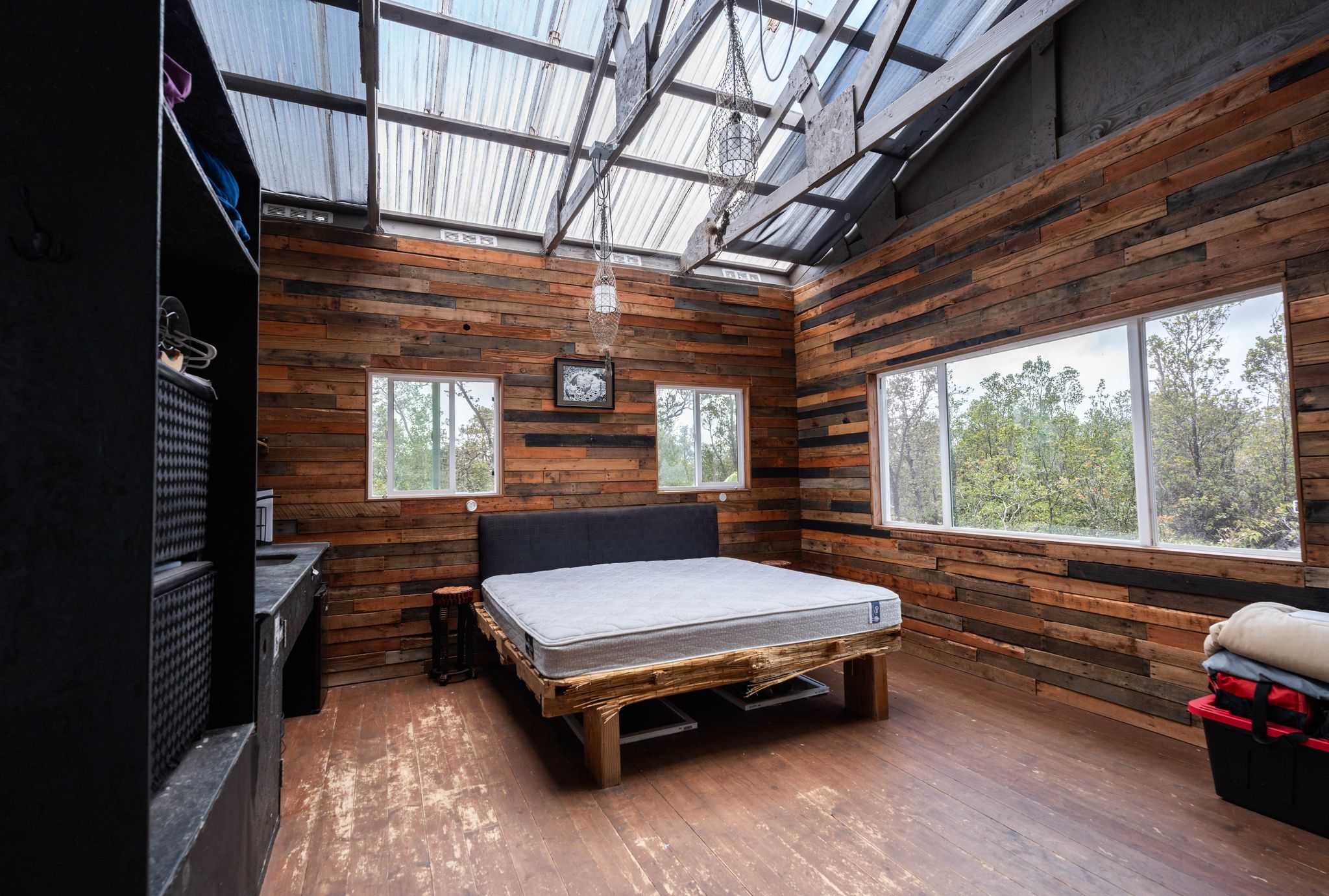 a sitting area with furniture and wooden deck