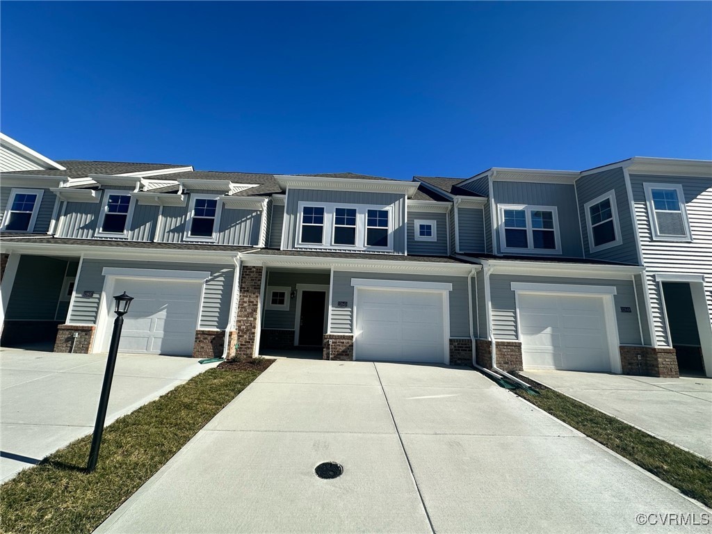 View of property featuring a garage