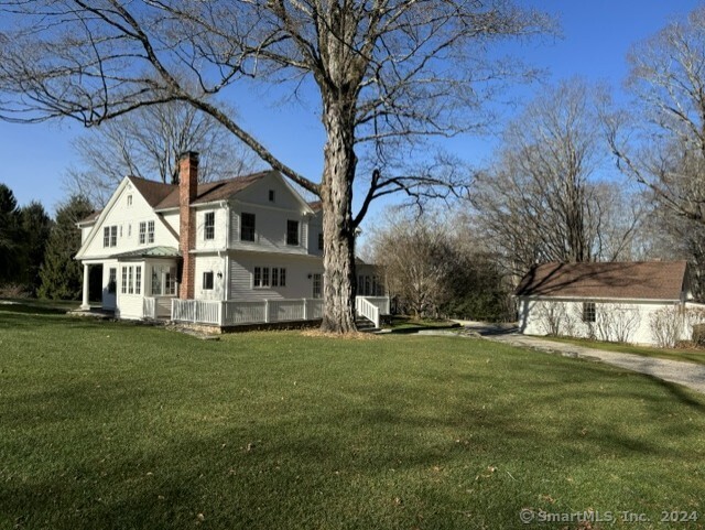 a view of a house with a big yard