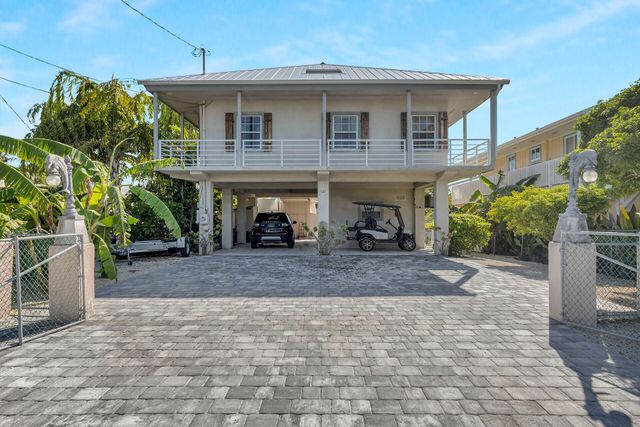 $1,200,000 | 121 Long Key Lake Drive | Layton