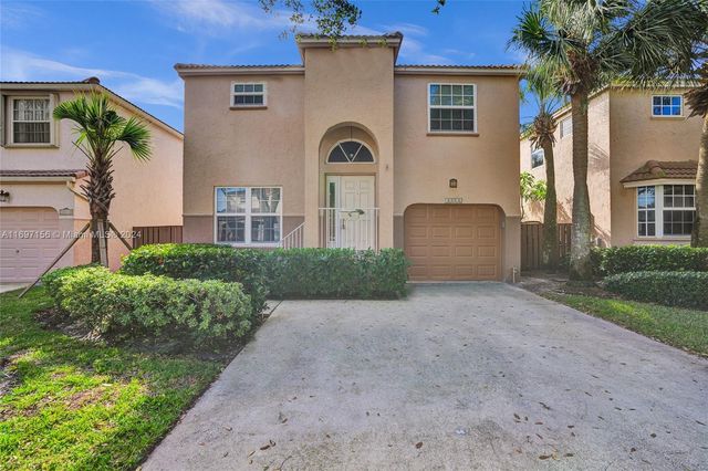 $580,000 | 10820 Northwest 12th Place | Jacaranda