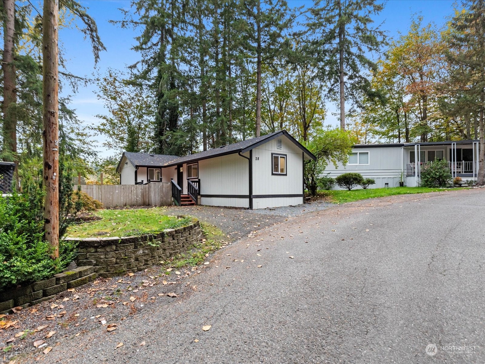 a view of house with outdoor space and street view