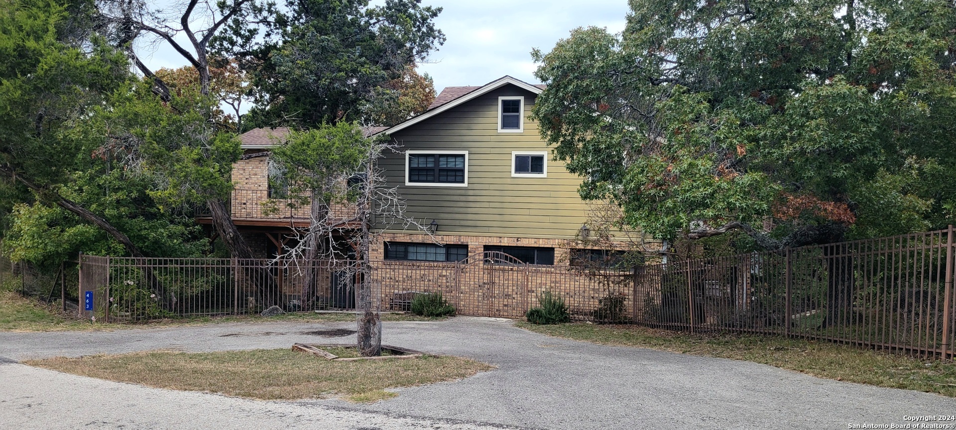 a front view of a house with street