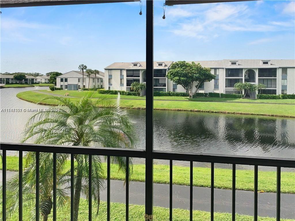 a view of swimming pool from a balcony