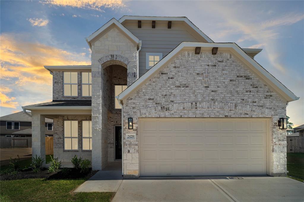 Welcome home to 29219 Live Tree Court located in Forest Village and zoned to Conroe ISD.