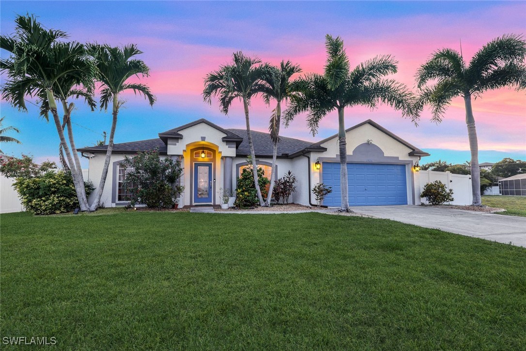 a house with palm tree in front of it