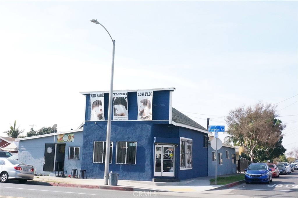 a view of a building with a street