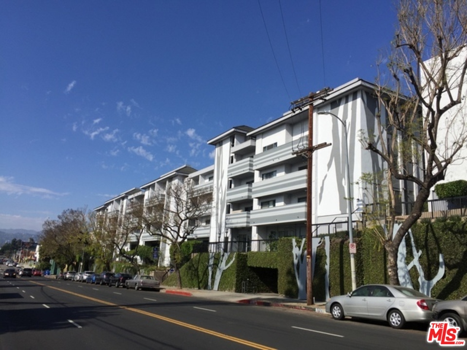 a view of a building and a street