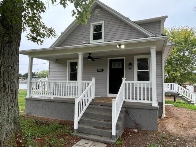 a front view of a house with a porch