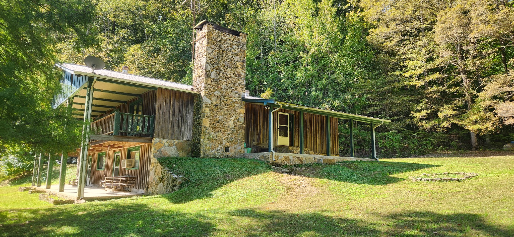 a front view of a house with yard