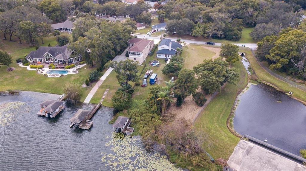 an aerial view of a house with a swimming pool