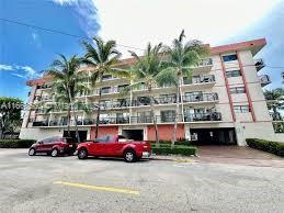 a view of a cars parked in front of a building