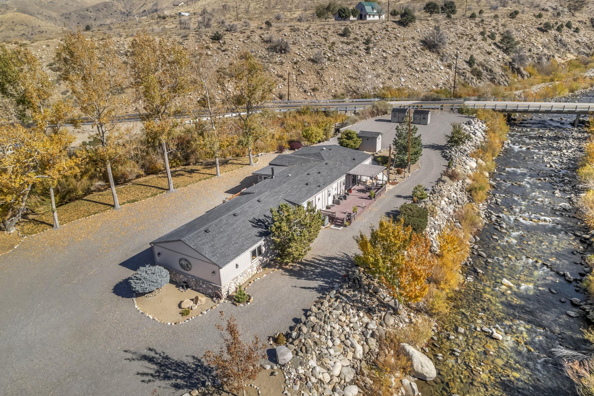 an aerial view of house with yard