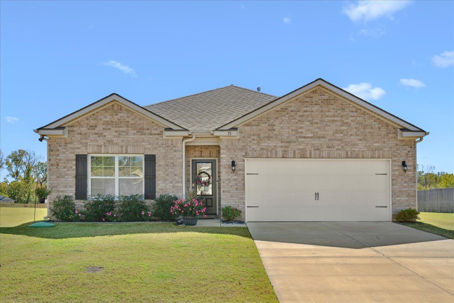 a front view of house with yard