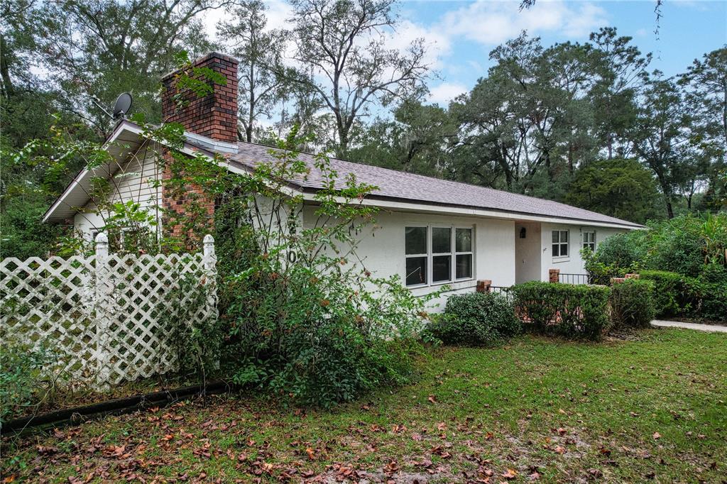 a view of a house with a garden