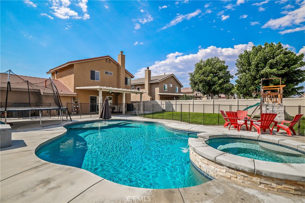 a view of a house with swimming pool