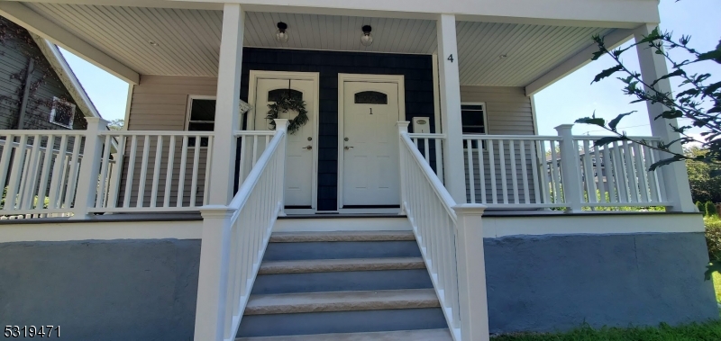 a view of a stairs and an entrance door