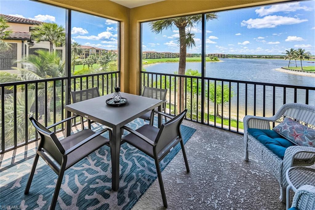 a view of a chairs and table in patio