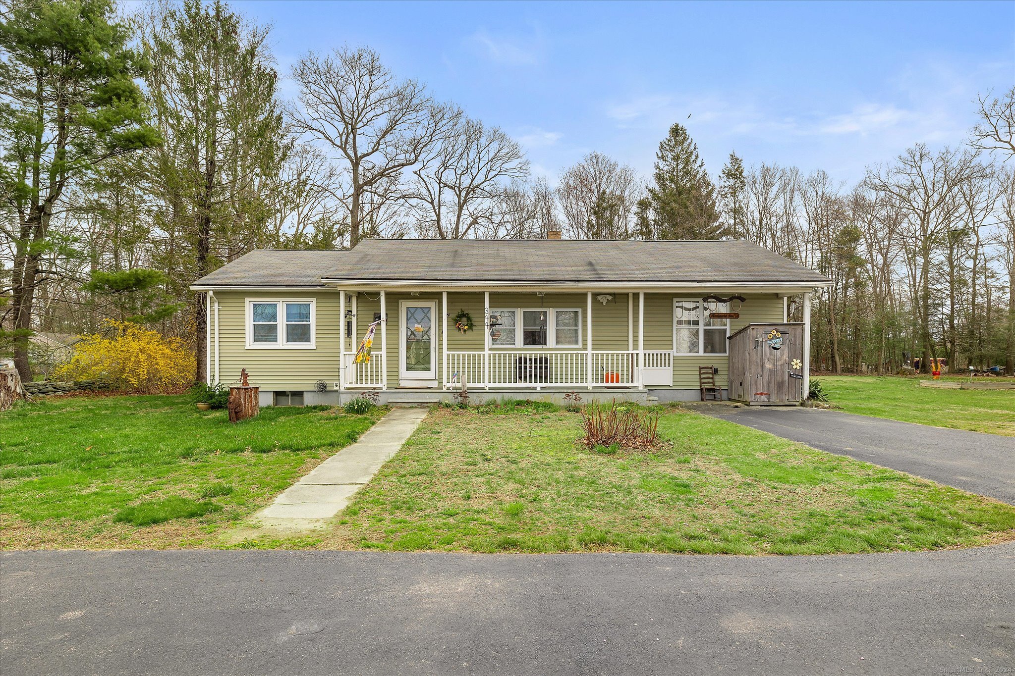 front view of a house with a yard