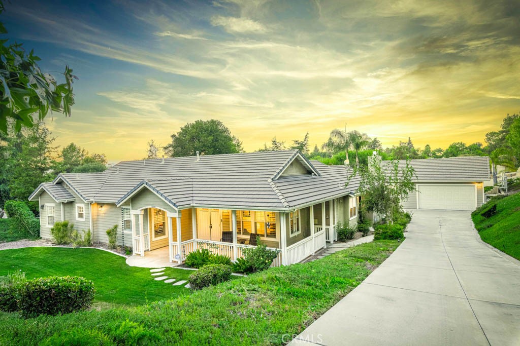 a view of house with garden