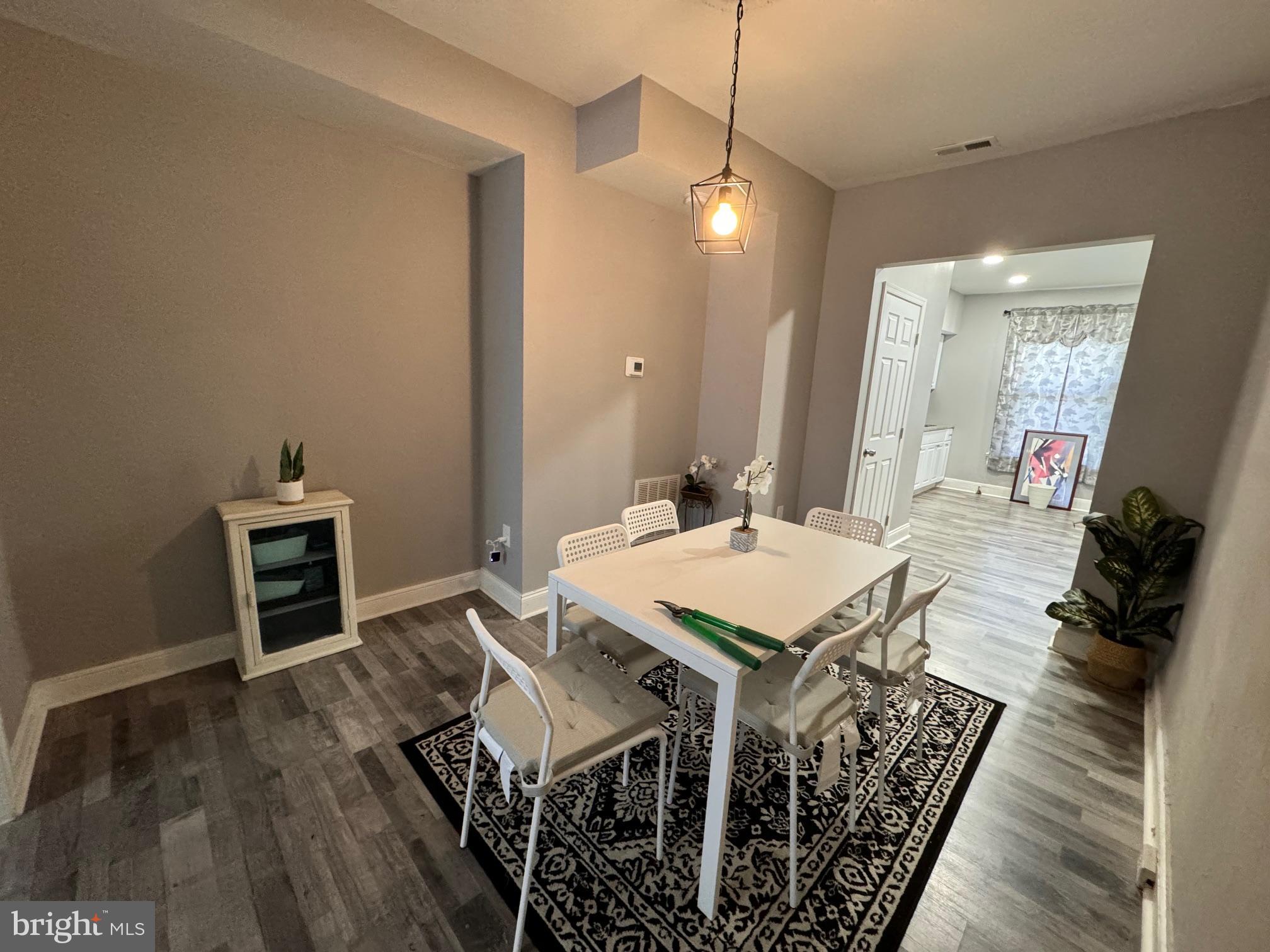 a view of a dining room with furniture